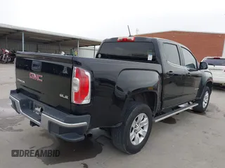 2015 GMC Canyon 2WD SLE with VIN 1GTG5BE30F1139093, listed as a IAAI auction lot 41596657 with 143,834 mi miles. Bid and sale history available at carsss.com. Image 4.