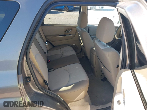 2006 Mercury Mariner Luxury with VIN 4M2YU56156KJ11686, listed as a IAAI auction lot 41854750 with 145,048 mi miles and . Bid and sale history available at DreamBid. Image 8.