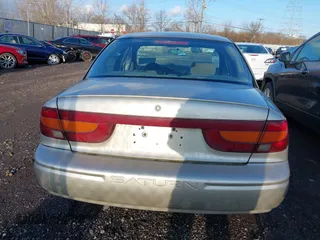 2002 Saturn SL with VIN 1G8ZK52752Z194235, listed as a IAAI auction lot 41792837 with 152,337 mi miles. Bid and sale history available at carsss.com. Image 16.