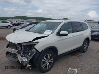2018 Honda Pilot EX-L with VIN 5FNYF5H55JB016471, listed as a IAAI auction lot 42397519 with 102,482 mi miles and . Bid and sale history available at DreamBid. Image 2.