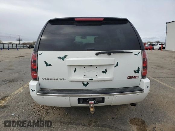 2008 GMC Yukon XL z VIN 1GKFK66858J243561, wystawiony jako Copart lot #50010235 z przebiegiem 152 837 mil mil oraz Szkoda całkowita • Salvage title. Historia ofert i sprzedaży dostępna na DreamBid. Obrazek 6.