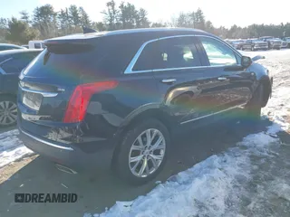 2017 Cadillac XT5 Premium Luxury AWD with VIN 1GYKNERS3HZ102955, listed as a IAAI auction lot 40986583 with 80,729 mi miles. Bid and sale history available at carsss.com. Image 4.