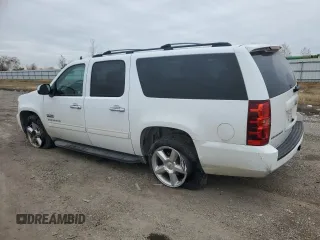 2010 Chevrolet Suburban LS with VIN 1GNUCHE05AR183058, listed as a Copart auction lot 89012175 with 236,493 mi miles and Salvage Title. Bid and sale history available at carsss.com. Image 2.