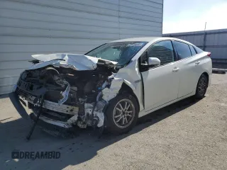 2020 Toyota Prius LE z VIN JTDKARFP5L3158691, wystawiony jako Copart lot #55255125 z przebiegiem Nie podano mil oraz Szkoda całkowita • Salvage title. Historia ofert i sprzedaży dostępna na DreamBid. Obrazek 1.