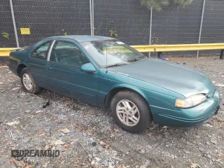 1997 Ford Thunderbird LX with VIN 1FALP6245VH171563, listed as a Copart auction lot 81970734 with 67,304 mi miles and Clean Title. Bid and sale history available at DreamBid. Image 4.