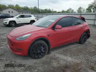 2023 Tesla Model Y Long Range z VIN 7SAYGAEE1PF690008, wystawiony jako Copart lot #54441735 z przebiegiem 38 291 mil mil oraz Szkody całkowita. Historia ofert i sprzedaży dostępna na DreamBid. Obrazek 1.