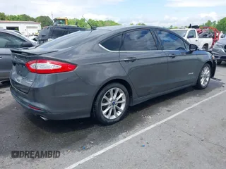 2016 Ford Fusion SE Hybrid с VIN 3FA6P0LU6GR127095, выставлен на аукционе IAAI как лот 42013324 с пробегом 134 474 миль миль и . История ставок и продаж доступна на DreamBid. Изображение 4.