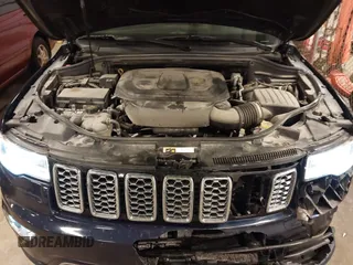 2017 Jeep Grand Cherokee Overland with VIN 1C4RJFCG3HC693897, listed as a IAAI auction lot 41636323 with 105,575 mi miles. Bid and sale history available at carsss.com. Image 10.