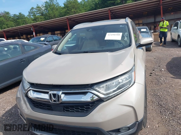 2018 Honda CR-V Touring with VIN 5J6RW2H96JL000910, listed as a IAAI auction lot 42490580 with 201,534 mi miles and . Bid and sale history available at DreamBid. Image 12.