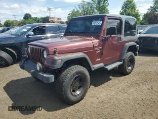 2001 Jeep Wrangler Sport z VIN 1J4FA49S41P316474, wystawiony jako Copart lot #63073545 z przebiegiem 228 747 mil mil oraz Nie do naprawy • Non repairable. Historia ofert i sprzedaży dostępna na DreamBid. Obrazek 1.