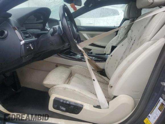 2015 BMW 6 Series 640i with VIN WBA6A0C59FGB53667, listed as a Copart auction lot 74034834 with Not Provided miles and Salvage Title. Bid and sale history available at DreamBid. Image 7.