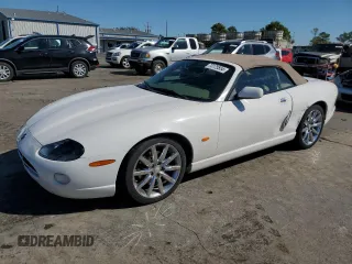 2006 Jaguar XK with VIN SAJDA42C662A46284, listed as a Copart auction lot 73175554 with 99,679 mi miles and Salvage Title. Bid and sale history available at carsss.com. Image 1.
