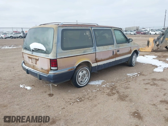 1991 Dodge Grand Caravan with VIN 1B4GK54R4MX558183, listed as a IAAI auction lot 41604086 with 210,400 mi miles and . Bid and sale history available at DreamBid. Image 4.
