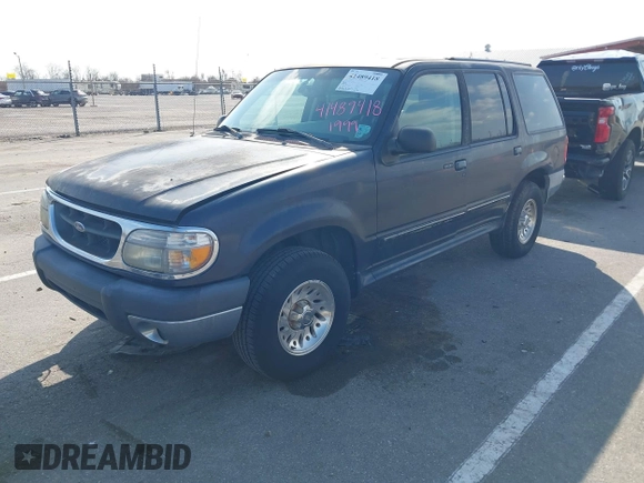 1999 Ford Explorer XLT z VIN 1FMZU32E6XUA07927, wystawiony jako IAAI lot #41489418 z przebiegiem 246 806 mil mil oraz . Historia ofert i sprzedaży dostępna na DreamBid. Obrazek 2.