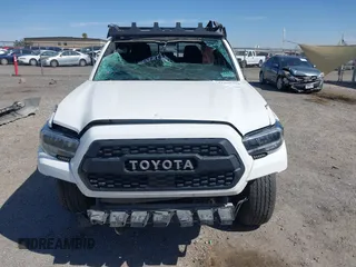 2021 Toyota Tacoma SR с VIN 3TYCZ5AN3MT052496, выставлен на аукционе IAAI как лот 41999250 с пробегом 76 194 миль миль и . История ставок и продаж доступна на DreamBid. Изображение 6.