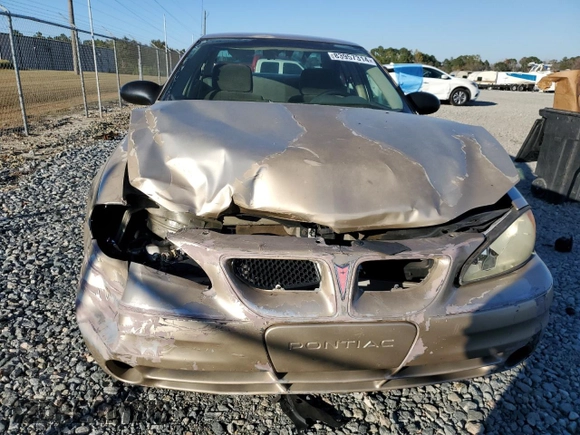 2004 Pontiac Grand Am SE1 with VIN 1G2NF52E64M563647, listed as a Copart auction lot 83957314 with 0 mi miles and Salvage Title. Bid and sale history available at carsss.com. Image 5.