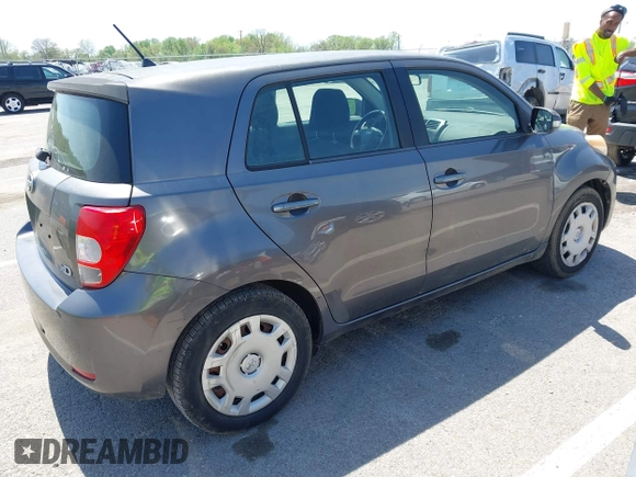 2008 Scion xD with VIN JTKKU10458J014660, listed as a IAAI auction lot 42100828 with 136,436 mi miles. Bid and sale history available at carsss.com. Image 4.