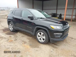 2021 Jeep Compass Latitude with VIN 3C4NJCBBXMT518158, listed as a IAAI auction lot 41485058 with 95,309 mi miles and . Bid and sale history available at carsss.com. Image 1.