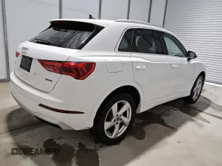 2021 Audi Q3 Premium with VIN WA1AUCF34M1090677, listed as a Copart auction lot 56111815 with 93,573 mi miles and Clean title. Bid and sale history available at DreamBid. Image 3.