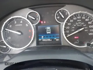 2017 Toyota Tundra SR z VIN 5TFUY5F12HX677173, wystawiony jako IAAI lot #41593761 z przebiegiem 186 206 mil mil oraz . Historia ofert i sprzedaży dostępna na DreamBid. Obrazek 7.