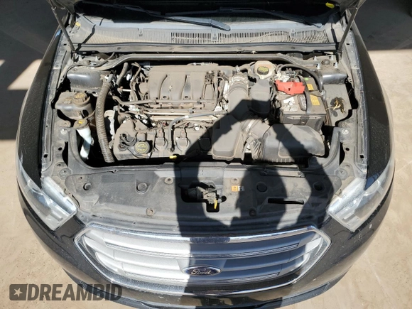 2015 Ford Taurus SEL with VIN 1FAHP2E82FG132241, listed as a Copart auction lot 53970065 with 114,947 mi miles and Salvage Title. Bid and sale history available at carsss.com. Image 11.