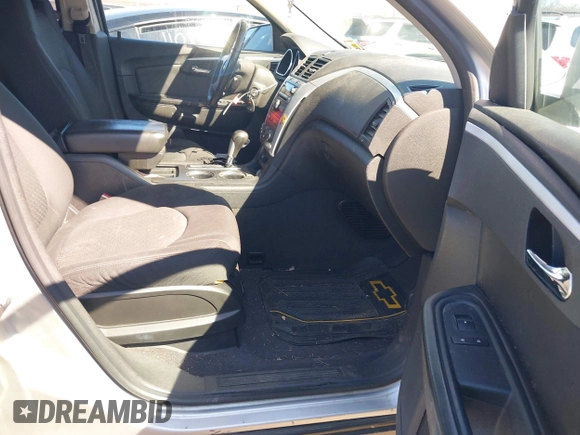 2012 Chevrolet Traverse 1LT z VIN 1GNKVGED3CJ230085, wystawiony jako IAAI lot #41752517 z przebiegiem 166 330 mil mil oraz . Historia ofert i sprzedaży dostępna na DreamBid. Obrazek 5.