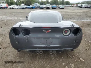 2011 Chevrolet Corvette 1LT z VIN 1G1YE2DW8B5105978, wystawiony jako Copart lot #75264194 z przebiegiem 144 427 mil mil oraz Szkoda całkowita • Salvage title. Historia ofert i sprzedaży dostępna na DreamBid. Obrazek 6.