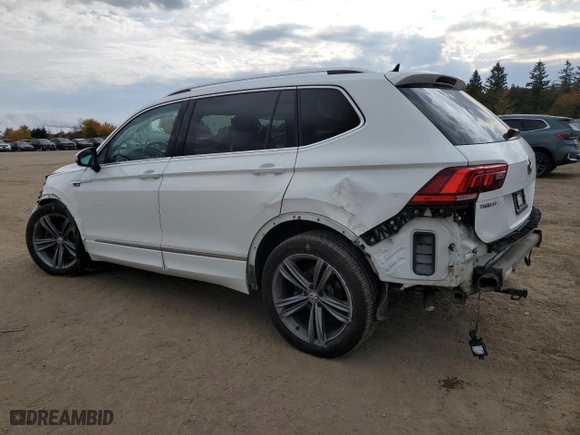 2020 Volkswagen Tiguan SEL Premium R-Line with VIN 3VV4B7AX8LM033024, listed as a Copart auction lot 77354494 with 127,247 mi miles and Salvage Title. Bid and sale history available at carsss.com. Image 2.