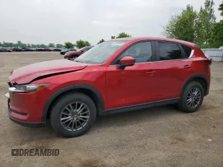 2018 Mazda CX-5 Touring z VIN JM3KFBCM2J0307275, wystawiony jako Copart lot #60036925 z przebiegiem 91 289 mil mil oraz Szkoda całkowita • Salvage title. Historia ofert i sprzedaży dostępna na DreamBid. Obrazek 1.