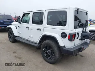 2023 Jeep Wrangler Sahara with VIN 1C4HJXEG5PW581632, listed as a IAAI auction lot 42462622 with 24,550 mi miles and . Bid and sale history available at DreamBid. Image 3.