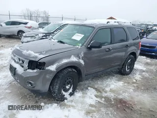2012 Ford Escape XLS z VIN 1FMCU9C72CKA10130, wystawiony jako IAAI lot #41543233 z przebiegiem 168 552 mil mil oraz . Historia ofert i sprzedaży dostępna na DreamBid. Obrazek 17.