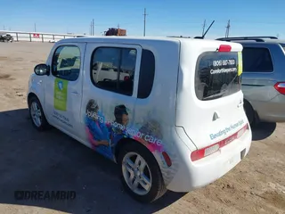2013 Nissan Cube SL z VIN JN8AZ2KR2DT304862, wystawiony jako IAAI lot #41615949 z przebiegiem 138 354 mil mil oraz . Historia ofert i sprzedaży dostępna na DreamBid. Obrazek 3.