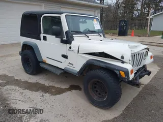 2005 Jeep Wrangler Sport with VIN 1J4FA49S25P352170, listed as a IAAI auction lot 41794958 with 154,304 mi miles. Bid and sale history available at carsss.com. Image 1.