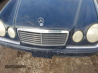 1999 Mercedes-Benz E-Class with VIN WDBJF65H1XA817789, listed as a IAAI auction lot 41818511 with 999,999 mi miles. Bid and sale history available at carsss.com. Image 6.
