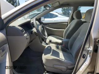 2005 Toyota Corolla CE with VIN 1NXBR32E65Z435061, listed as a Copart auction lot 55148175 with 58,673 mi miles and Salvage Title. Bid and sale history available at DreamBid. Image 7.