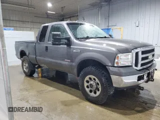 2005 Ford F-350 XL with VIN 1FTWX31P35EB41027, listed as a Copart auction lot 57124585 with 304,957 mi miles and Salvage title. Bid and sale history available at DreamBid. Image 4.