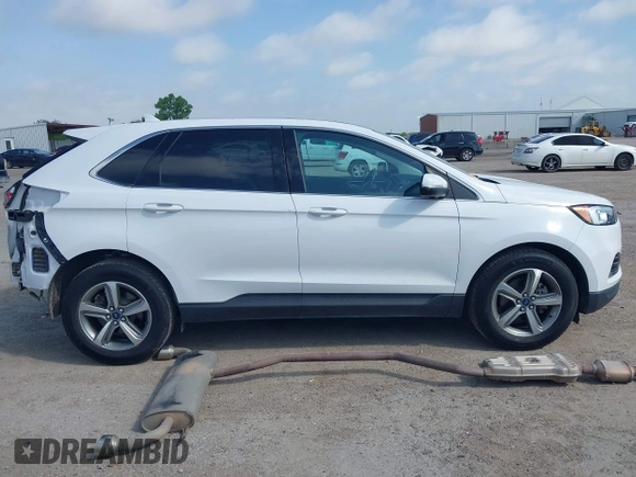 2019 Ford Edge SEL with VIN 2FMPK3J97KBC26735, listed as a IAAI auction lot 42482687 with 54,466 mi miles and . Bid and sale history available at DreamBid. Image 14.