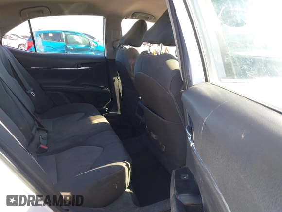 2019 Toyota Camry LE with VIN 4T1B11HK3KU772369, listed as a IAAI auction lot 41353103 with 85,565 mi miles and . Bid and sale history available at DreamBid. Image 8.