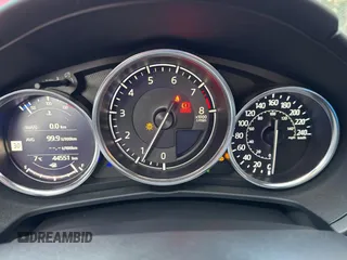 2021 Mazda MX-5 Miata Grand Touring z VIN JM1NDAM74M0461263, wystawiony jako Copart lot #81410634 z przebiegiem 44 551 mil mil oraz Szkoda całkowita • Salvage title. Historia ofert i sprzedaży dostępna na DreamBid. Obrazek 8.