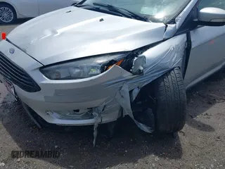 2017 Ford Focus SE with VIN 1FADP3FE4HL295573, listed as a IAAI auction lot 39562568 with 96,939 mi miles and . Bid and sale history available at carsss.com. Image 6.