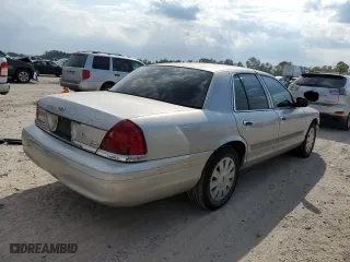2010 Ford Police Interceptor with VIN 2FABP7BV5AX123274, listed as a Copart auction lot 71176934 with 118,874 mi miles and Salvage Title. Bid and sale history available at carsss.com. Image 3.