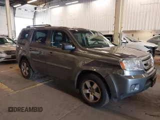 2011 Honda Pilot EX-L with VIN 5FNYF4H65BB020721, listed as a IAAI auction lot 41794436 with 113,630 mi miles and . Bid and sale history available at carsss.com. Image 1.