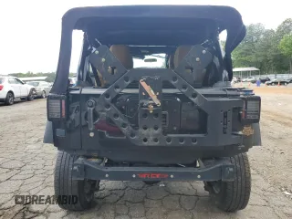 2012 Jeep Wrangler Unlimited Sport z VIN 1C4BJWDG7CL208265, wystawiony jako Copart lot #56101095 z przebiegiem 141 527 mil mil oraz Szkoda całkowita • Salvage title. Historia ofert i sprzedaży dostępna na DreamBid. Obrazek 6.