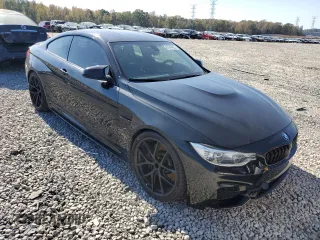 2015 BMW M4 with VIN WBS3R9C54FK334052, listed as a Copart auction lot 67044522 with 69,998 mi miles. Bid and sale history available at carsss.com. Image 1.