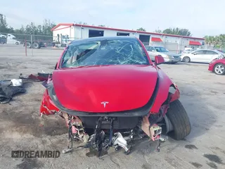 2021 Tesla Model Y Long Range z VIN 5YJYGAEE3MF184396, wystawiony jako IAAI lot #42321116 z przebiegiem Nie podano mil oraz . Historia ofert i sprzedaży dostępna na DreamBid. Obrazek 12.