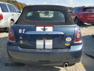 2009 MINI Convertible with VIN WMWMR33559TU96728, listed as a Copart auction lot 77949004 with 86,084 mi miles and Clean title. Bid and sale history available at DreamBid. Image 6.
