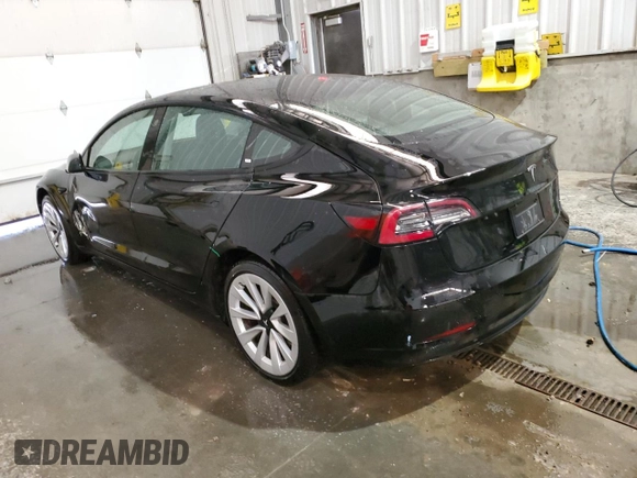 2023 Tesla Model 3 with VIN 5YJ3E1EA8PF451324, listed as a Copart auction lot 88318475 with 74,582 mi miles and Salvage Title. Bid and sale history available at DreamBid. Image 2.