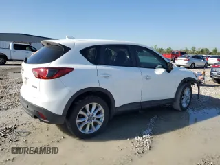 2015 Mazda CX-5 Grand Touring with VIN JM3KE2DY1F0453386, listed as a Copart auction lot 50580185 with 174,309 mi miles and Salvage Title. Bid and sale history available at carsss.com. Image 3.