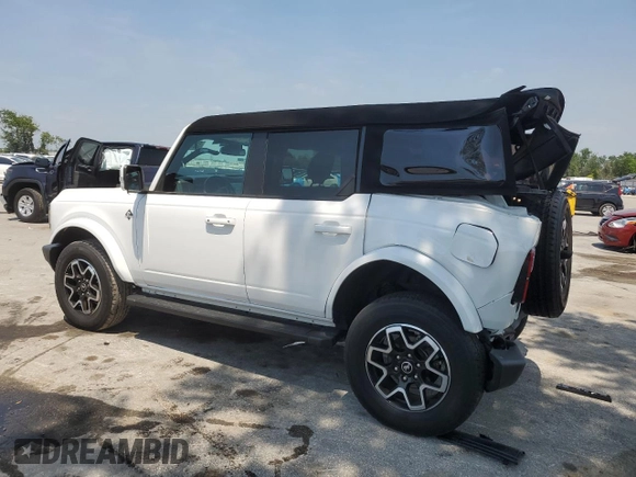 2021 Ford Bronco with VIN 1FMEE5BP2MLA94820, listed as a Copart auction lot 52015085 with 33,606 mi miles and Salvage title. Bid and sale history available at DreamBid. Image 2.