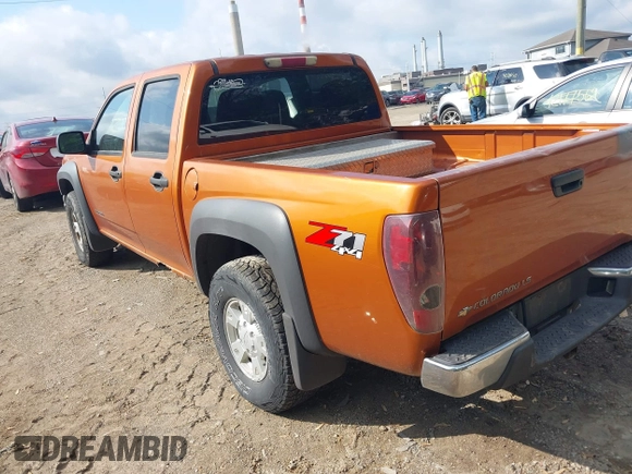 2005 Chevrolet Colorado 1SF LS Z71 with VIN 1GCDT136758169021, listed as a IAAI auction lot 42175159 with 217,734 mi miles. Bid and sale history available at carsss.com. Image 3.